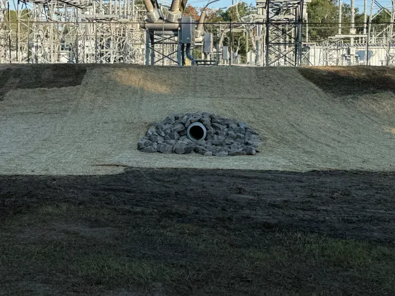 Storm drain pipe with a rock outlet